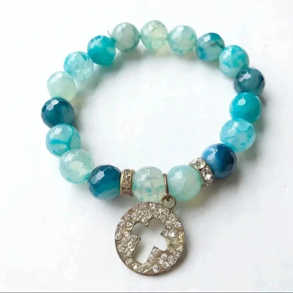 Turquoise Blue Beaded Cross Bracelet - Picture 1 of 6